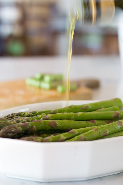 drizzle oil on asparagus